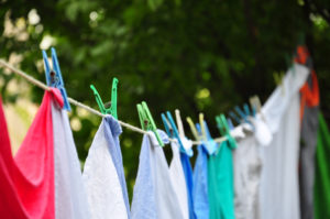 colorful clothes laundry hanging on a clothesline outdoor